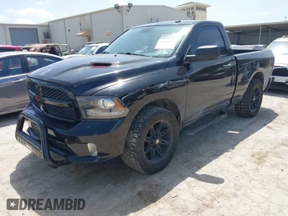 2013 Ram 1500 Express with VIN 3C6JR6AT8DG592679, listed as a IAAI auction lot 42701097 with 147,006 mi miles and . Bid and sale history available at DreamBid. Image 2.