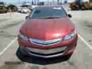 2016 Chevrolet Volt Premier z VIN 1G1RD6S50GU136423, wystawiony jako Copart lot #63351723 z przebiegiem 94 448 mil mil oraz . Historia ofert i sprzedaży dostępna na DreamBid. Obrazek 5.