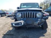 ✅ 2022 Jeep Wrangler Unlimited Sahara • VIN: 1C4HJXEM7NW206585 • Lot: 42102516. Listed on IAAI with 10,769 mi. Free auction sales archive from the USA and detailed vehicle history report at DreamBid. Image 21.