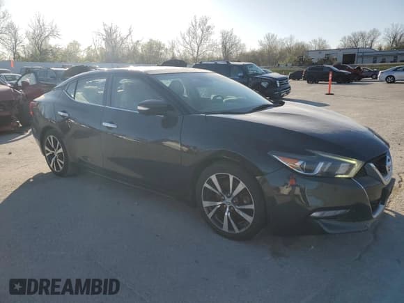 ✅ 2017 Nissan Maxima S • VIN: 1N4AA6AP4HC365801 • Lot: 52754195. Listed on Copart with 141,033 mi. Free auction sales archive from the USA and detailed vehicle history report at DreamBid. Image 4.
