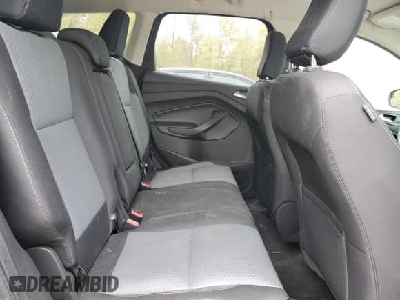 2018 Ford Escape SE z VIN 1FMCU9GD7JUA05961, wystawiony jako Copart lot #82458805 z przebiegiem Nie podano mil oraz Czysty tytuł • Clean title. Historia ofert i sprzedaży dostępna na DreamBid. Obrazek 11.