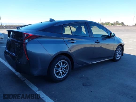 ✅ 2017 Toyota Prius Two • VIN: JTDKBRFU2H3029608 • Lot: 43480732. Listed on IAAI with 154,628 mi. Free auction sales archive from the USA and detailed vehicle history report at DreamBid. Image 4.
