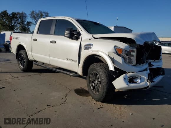✅ 2017 Nissan Titan Pro-4X • VIN: 1N6AA1E58HN548609 • Lot: 90290125. Listed on Copart with 72,769 mi. Free auction sales archive from the USA and detailed vehicle history report at DreamBid. Image 4.