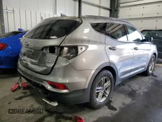 ✅ 2017 Hyundai Santa Fe 2.4L • VIN: 5NMZUDLB4HH033773 • Лот: 65376492. Опубликован ранее на Copart с пробегом 70 351 миль. Бесплатный доступ к архиву аукционных продаж из США и подробный отчёт об истории автомобиля на DreamBid. Изображение 4.