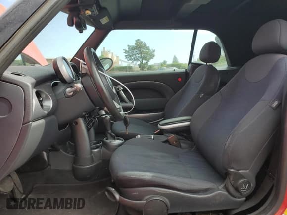 ✅ 2008 MINI Convertible • VIN: WMWRF33558TG18147 • Lot: 53547385. Listed on Copart with 131,458 mi. Free auction sales archive from the USA and detailed vehicle history report at DreamBid. Image 7.