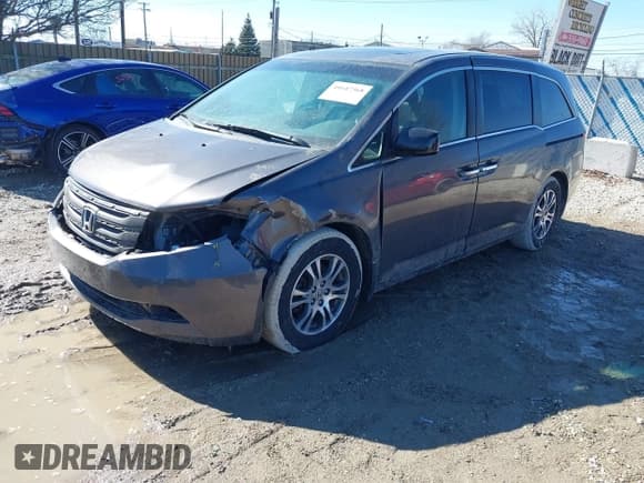 ✅ 2012 Honda Odyssey EX-L • VIN: 5FNRL5H61CB095761 • Lot: 41647368. Listed on IAAI with 146,661 mi. Free auction sales archive from the USA and detailed vehicle history report at DreamBid. Image 19.