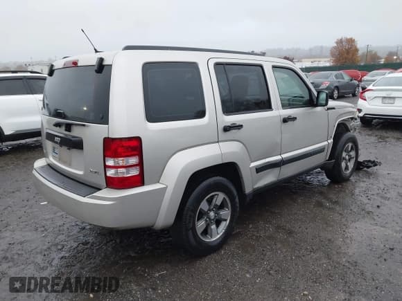 ✅ 2008 Jeep Liberty Sport • VIN: 1J8GN28K98W282058 • Lot: 43559942. Listed on IAAI with 168,429 mi. Free auction sales archive from the USA and detailed vehicle history report at DreamBid. Image 4.