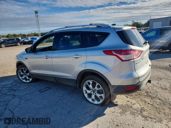 ✅ 2013 Ford Escape Titanium • VIN: 1FMCU0J91DUA59244 • Lot: 90041235. Listed on Copart with 109,309 mi. Free auction sales archive from the USA and detailed vehicle history report at DreamBid. Image 2.
