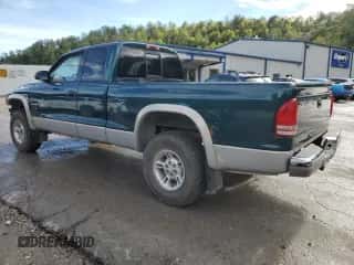 1999 Dodge Dakota SLT z VIN 1B7GG22Y1XS285749, wystawiony jako Copart lot #73038674 z przebiegiem 153 048 mil mil oraz Szkoda całkowita • Salvage title. Historia ofert i sprzedaży dostępna na DreamBid. Obrazek 2.