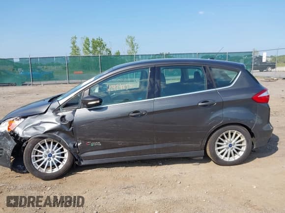 ✅ 2016 Ford C-Max SEL • VIN: 1FADP5CU8GL112553 • Лот: 42924850. Опубликован ранее на IAAI с пробегом 119 257 миль. Бесплатный доступ к архиву аукционных продаж из США и подробный отчёт об истории автомобиля на DreamBid. Изображение 14.