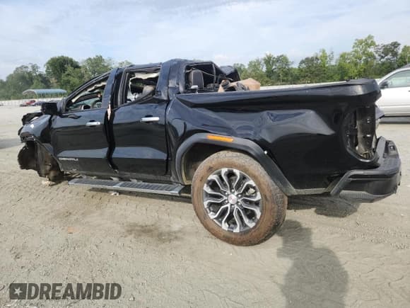 ✅ 2023 GMC Canyon 4WD Denali • VIN: 1GTP6FEK6P1263009 • Лот: 70935815. Опубликован ранее на Copart с пробегом Не указан. Бесплатный доступ к архиву аукционных продаж из США и подробный отчёт об истории автомобиля на DreamBid. Изображение 2.