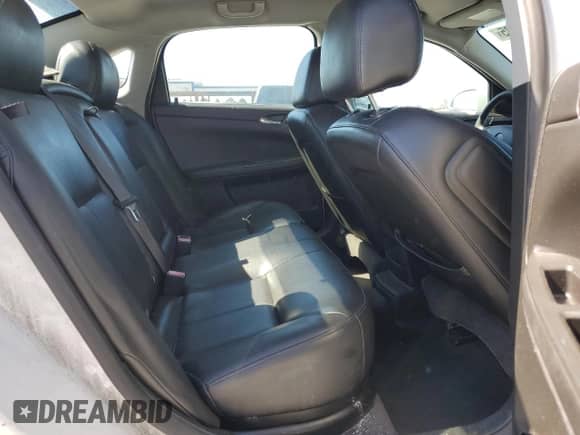 ✅ 2013 Chevrolet Impala LTZ • VIN: 2G1WC5E38D1215761 • Lot: 90534035. Listed on Copart with 205,467 mi. Free auction sales archive from the USA and detailed vehicle history report at DreamBid. Image 10.