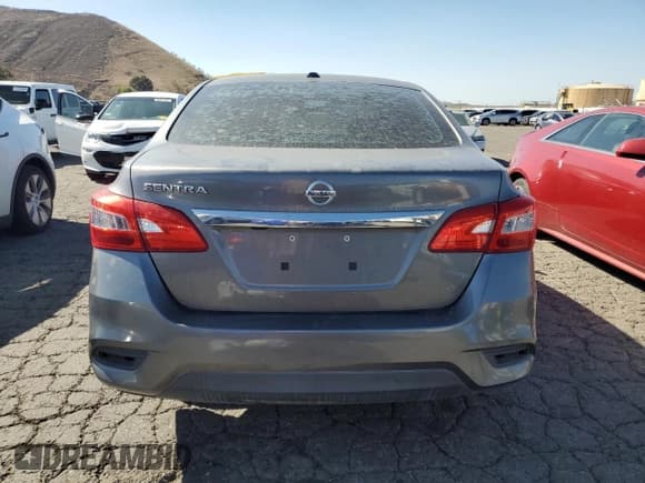 ✅ 2018 Nissan Sentra S • VIN: 3N1AB7AP1JY290164 • Lot: 89506285. Listed on Copart with 115,106 mi. Free auction sales archive from the USA and detailed vehicle history report at DreamBid. Image 6.