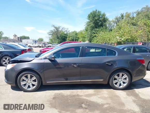 ✅ 2013 Buick LaCrosse Leather • VIN: 1G4GC5E30DF120367 • Лот: 43093786. Опубликован ранее на IAAI с пробегом 132 953 миль. Бесплатный доступ к архиву аукционных продаж из США и подробный отчёт об истории автомобиля на DreamBid. Изображение 14.