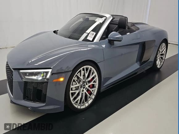 ✅ 2020 Audi R8 • VIN: WUAVECFX4L7900119 • Лот: 91356725. Опубликован ранее на Copart с пробегом 32 372 миль. Бесплатный доступ к архиву аукционных продаж из США и подробный отчёт об истории автомобиля на DreamBid. Изображение 2.