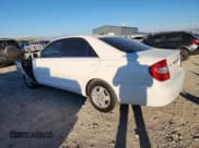 ✅ 2003 Toyota Camry LE • VIN: 4T1BF32K03U057864 • Lot: 89484355. Wystawiony na Copart z przebiegiem 205 753 mil. Bezpłatny archiwum sprzedaży aukcyjnych z USA i szczegółowy raport historii pojazdu na DreamBid. Zdjęcie 2.