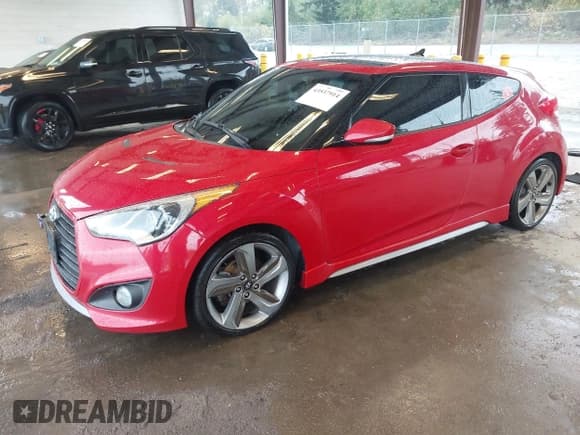 ✅ 2013 Hyundai Veloster Turbo • VIN: KMHTC6AE9DU106071 • Лот: 43537914. Опубликован ранее на IAAI с пробегом 165 739 миль. Бесплатный доступ к архиву аукционных продаж из США и подробный отчёт об истории автомобиля на DreamBid. Изображение 2.