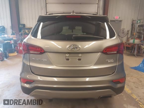 ✅ 2018 Hyundai Santa Fe 2.4L • VIN: 5NMZUDLB2JH072593 • Лот: 42846562. Опубликован ранее на IAAI с пробегом 56 789 миль. Бесплатный доступ к архиву аукционных продаж из США и подробный отчёт об истории автомобиля на DreamBid. Изображение 16.