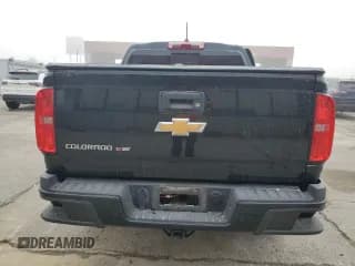 ✅ 2019 Chevrolet Colorado 4WD Z71 • VIN: 1GCGTDEN5K1329341 • Лот: 71913234. Опубликован ранее на Copart с пробегом 56 159 миль. Бесплатный доступ к архиву аукционных продаж из США и подробный отчёт об истории автомобиля на DreamBid. Изображение 6.