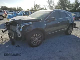 ✅ 2019 Cadillac XT5 Luxury FWD • VIN: 1GYKNCRS7KZ162538 • Лот: 87393885. Опубликован ранее на Copart с пробегом 49 928 миль. Бесплатный доступ к архиву аукционных продаж из США и подробный отчёт об истории автомобиля на DreamBid. Изображение 1.
