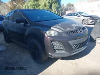 ✅ 2010 Mazda CX-7 Sport • VIN: JM3ER2WM8A0328227 • Lot: 43852161. Listed on IAAI with 238,378 mi. Free auction sales archive from the USA and detailed vehicle history report at DreamBid. Image 1.