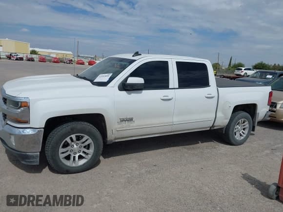 ✅ 2018 Chevrolet Silverado 1500 LT • VIN: 3GCPCREHXJG339211 • Лот: 42553890. Опубликован ранее на IAAI с пробегом 124 513 миль. Бесплатный доступ к архиву аукционных продаж из США и подробный отчёт об истории автомобиля на DreamBid. Изображение 14.