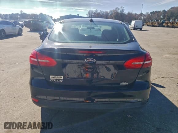 ✅ 2018 Ford Focus SE • VIN: 1FADP3FE5JL318977 • Lot: 94295725. Listed on Copart with 102,727 mi. Free auction sales archive from the USA and detailed vehicle history report at DreamBid. Image 6.