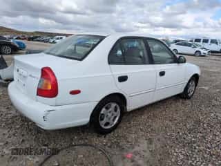2002 Hyundai Accent GL z VIN KMHCG45C82U358523, wystawiony jako Copart lot #48247575 z przebiegiem 164 869 mil mil oraz Szkoda całkowita • Salvage title. Historia ofert i sprzedaży dostępna na DreamBid. Obrazek 3.