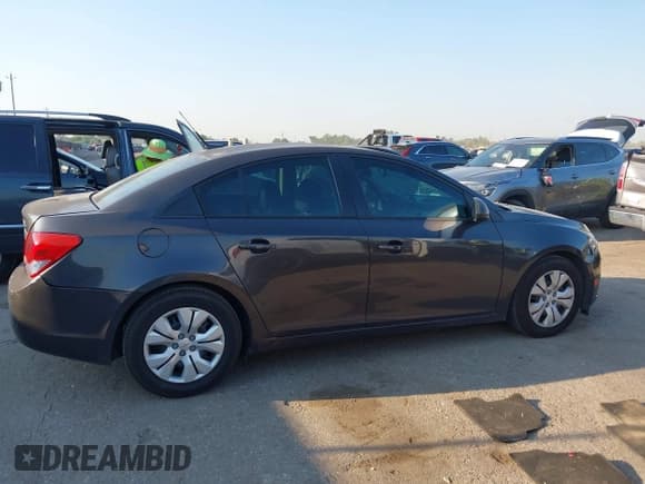 ✅ 2014 Chevrolet Cruze LS • VIN: 1G1PA5SH1E7365290 • Лот: 43334281. Опубликован ранее на IAAI с пробегом 160 521 миль. Бесплатный доступ к архиву аукционных продаж из США и подробный отчёт об истории автомобиля на DreamBid. Изображение 13.