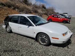 ✅ 2000 Saturn SW • VIN: 1G8ZJ8279YZ118174 • Лот: 48820105. Опубликован ранее на Copart с пробегом 205 882 миль. Бесплатный доступ к архиву аукционных продаж из США и подробный отчёт об истории автомобиля на DreamBid. Изображение 4.