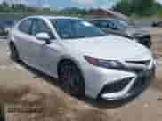 2023 Toyota Camry SE with VIN 4T1T11BK5PU089206, listed as a IAAI auction lot 42751729 with 14,798 mi miles and . Bid and sale history available at DreamBid. Image 1.