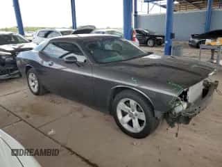 2013 Dodge Challenger SXT z VIN 2C3CDYAG2DH723883, wystawiony jako Copart lot #65486144 z przebiegiem 295 787 mil mil oraz Szkoda całkowita • Salvage title. Historia ofert i sprzedaży dostępna na DreamBid. Obrazek 4.