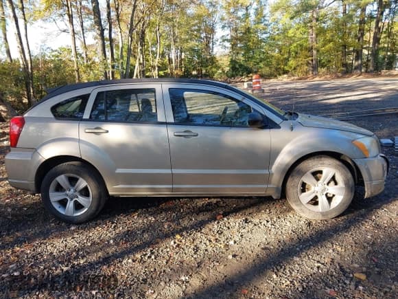 ✅ 2010 Dodge Caliber SXT • VIN: 1B3CB4HA5AD630099 • Lot: 43511222. Wystawiony na IAAI z przebiegiem 140 963 mil. Bezpłatny archiwum sprzedaży aukcyjnych z USA i szczegółowy raport historii pojazdu na DreamBid. Zdjęcie 13.