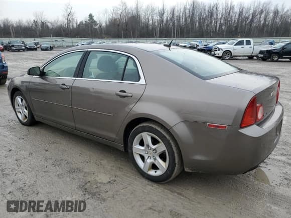 ✅ 2011 Chevrolet Malibu 1LS • VIN: 1G1ZB5E14BF164909 • Lot: 84567644. Listed on Copart with 110,756 mi. Free auction sales archive from the USA and detailed vehicle history report at DreamBid. Image 2.