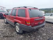 ✅ 2002 Jeep Grand Cherokee Laredo • VIN: 1J4GW48S82C316851 • Lot: 43260328. Listed on IAAI with 167,363 mi. Free auction sales archive from the USA and detailed vehicle history report at DreamBid. Image 3.