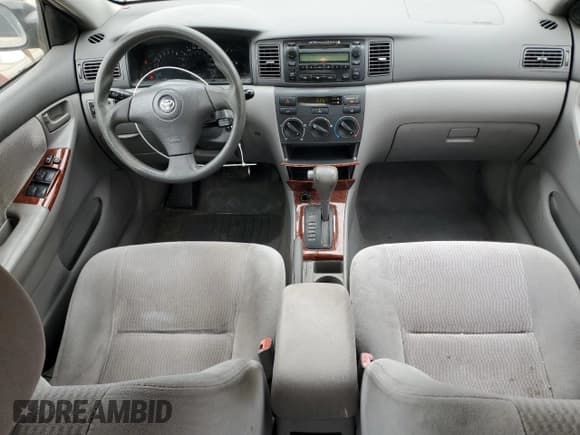 ✅ 2005 Toyota Corolla CE • VIN: 1NXBR32E75Z415742 • Lot: 57185205. Listed on Copart with 299,999 mi. Free auction sales archive from the USA and detailed vehicle history report at DreamBid. Image 8.