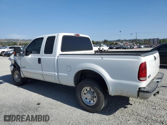 ✅ 2003 Ford F-250 XL • VIN: 1FTNX20P13EC01844 • Lot: 57885055. Listed on Copart with 214,023 mi. Free auction sales archive from the USA and detailed vehicle history report at DreamBid. Image 2.
