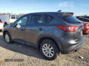 ✅ 2014 Mazda CX-5 Touring • VIN: JM3KE4CY9E0351717 • Lot: 92629565. Wystawiony na Copart z przebiegiem 94 979 mil. Bezpłatny archiwum sprzedaży aukcyjnych z USA i szczegółowy raport historii pojazdu na DreamBid. Zdjęcie 2.