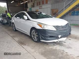 2013 Hyundai Azera с VIN KMHFH4JG6DA245483, выставлен на аукционе IAAI как лот 43536359 с пробегом 163 921 миль миль и . История ставок и продаж доступна на DreamBid. Изображение 1.