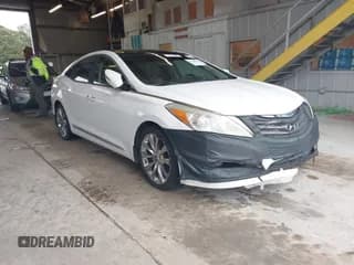✅ 2013 Hyundai Azera • VIN: KMHFH4JG6DA245483 • Лот: 43536359. Опубликован ранее на IAAI с пробегом 163 921 миль. Бесплатный доступ к архиву аукционных продаж из США и подробный отчёт об истории автомобиля на DreamBid. Изображение 1.