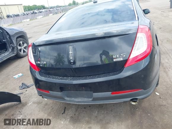 ✅ 2014 Lincoln MKS • VIN: 1LNHL9EKXEG612063 • Lot: 42347630. Listed on IAAI with 106,643 mi. Free auction sales archive from the USA and detailed vehicle history report at DreamBid. Image 17.