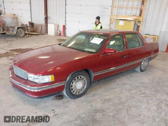 ✅ 1996 Cadillac DeVille • VIN: 1G6KD52Y6TU299832 • Lot: 42371201. Listed on IAAI with Not provided. Free auction sales archive from the USA and detailed vehicle history report at DreamBid. Image 2.