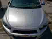 2014 Chevrolet Sonic LT с VIN 1G1JC6SH1E4101283, выставлен на аукционе Copart как лот 65836944 с пробегом Не указан миль и Списание • Salvage title. История ставок и продаж доступна на DreamBid. Изображение 11.