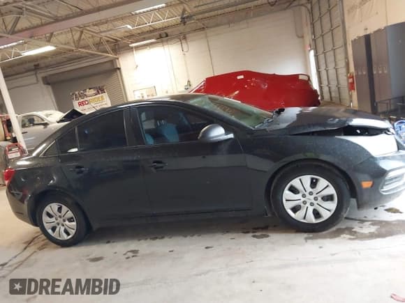 ✅ 2015 Chevrolet Cruze LS • VIN: 1G1PA5SHXF7205443 • Lot: 43491008. Listed on IAAI with 129,936 mi. Free auction sales archive from the USA and detailed vehicle history report at DreamBid. Image 13.