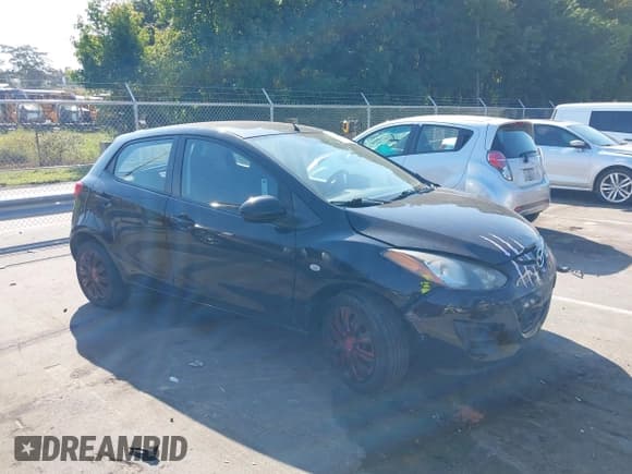 ✅ 2012 Mazda 2 Sport • VIN: JM1DE1KY7C0151577 • Lot: 43133663. Listed on IAAI with 69,363 mi. Free auction sales archive from the USA and detailed vehicle history report at DreamBid. Image 1.