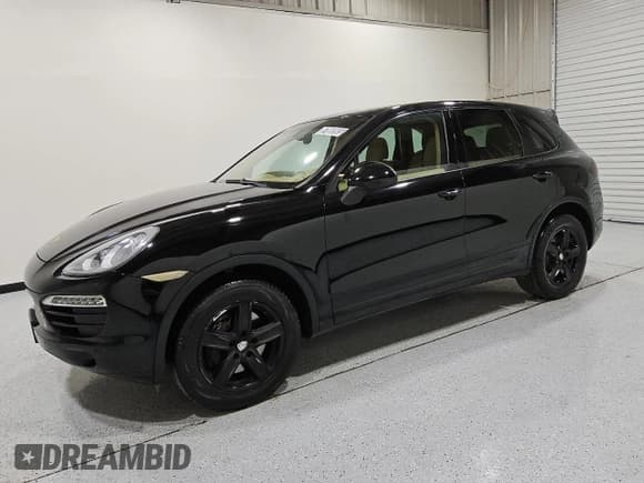 ✅ 2014 Porsche Cayenne • VIN: WP1AA2A21ELA96819 • Lot: 57865565. Listed on Copart with 135,181 mi. Free auction sales archive from the USA and detailed vehicle history report at DreamBid. Image 1.