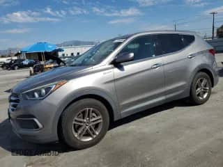 2018 Hyundai Santa Fe 2.4L с VIN 5NMZT3LB1JH089446, выставлен на аукционе Copart как лот 87306895 с пробегом 95 904 миль миль и Списание • Salvage title. История ставок и продаж доступна на DreamBid. Изображение 1.