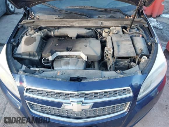 2013 Chevrolet Malibu LS z VIN 1G11A5SA5DU122963, wystawiony jako IAAI lot #41411921 z przebiegiem 193 880 mil mil oraz . Historia ofert i sprzedaży dostępna na DreamBid. Obrazek 10.