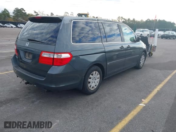 ✅ 2006 Honda Odyssey LX • VIN: 5FNRL38216B123368 • Lot: 43893556. Listed on IAAI with 229,501 mi. Free auction sales archive from the USA and detailed vehicle history report at DreamBid. Image 4.