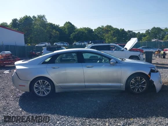 ✅ 2013 Lincoln MKZ • VIN: 3LN6L2GK5DR810147 • Lot: 40102072. Wystawiony na IAAI z przebiegiem 133 690 mil. Bezpłatny archiwum sprzedaży aukcyjnych z USA i szczegółowy raport historii pojazdu na DreamBid. Zdjęcie 13.
